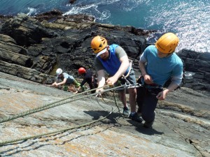 Ben picking Matt up on the abseil to rescue him!