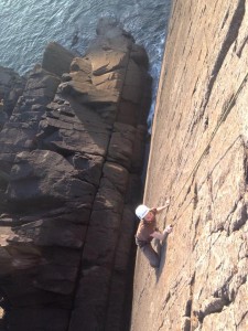 Visit Wales competition winner Huw, climbing at Porth Clais...