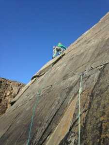 Ben questing up into the Danger Zone climbing in Pembrokeshire..