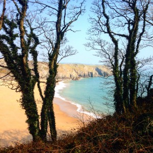 Climbing in pembrokeshire has it's perks! Walking across Barafundle to get to the crag..