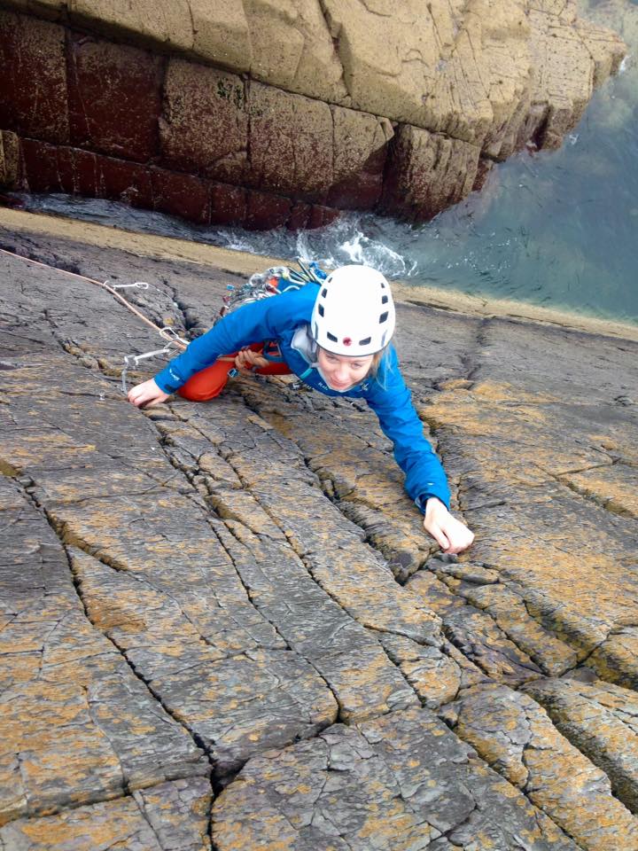 Laura on her first trad lead climb at Porth Clais!