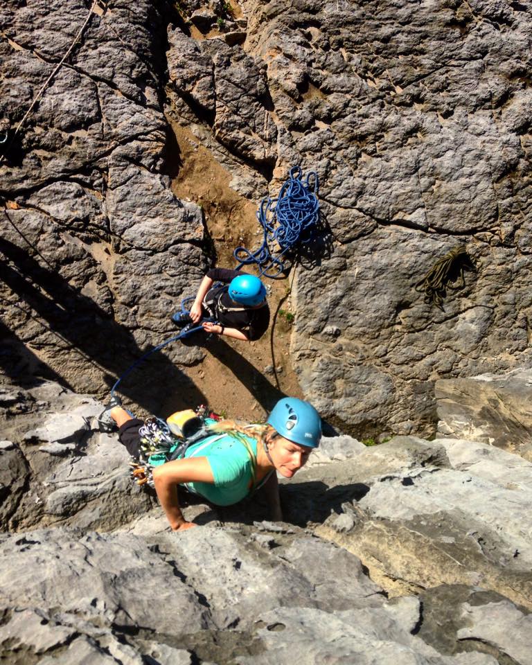 Lou leading during her SPA training in Pembrokeshire