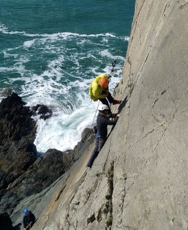 Working as a Mountaineering Instructor, teaching Lead Climbing in Pembrokeshire.