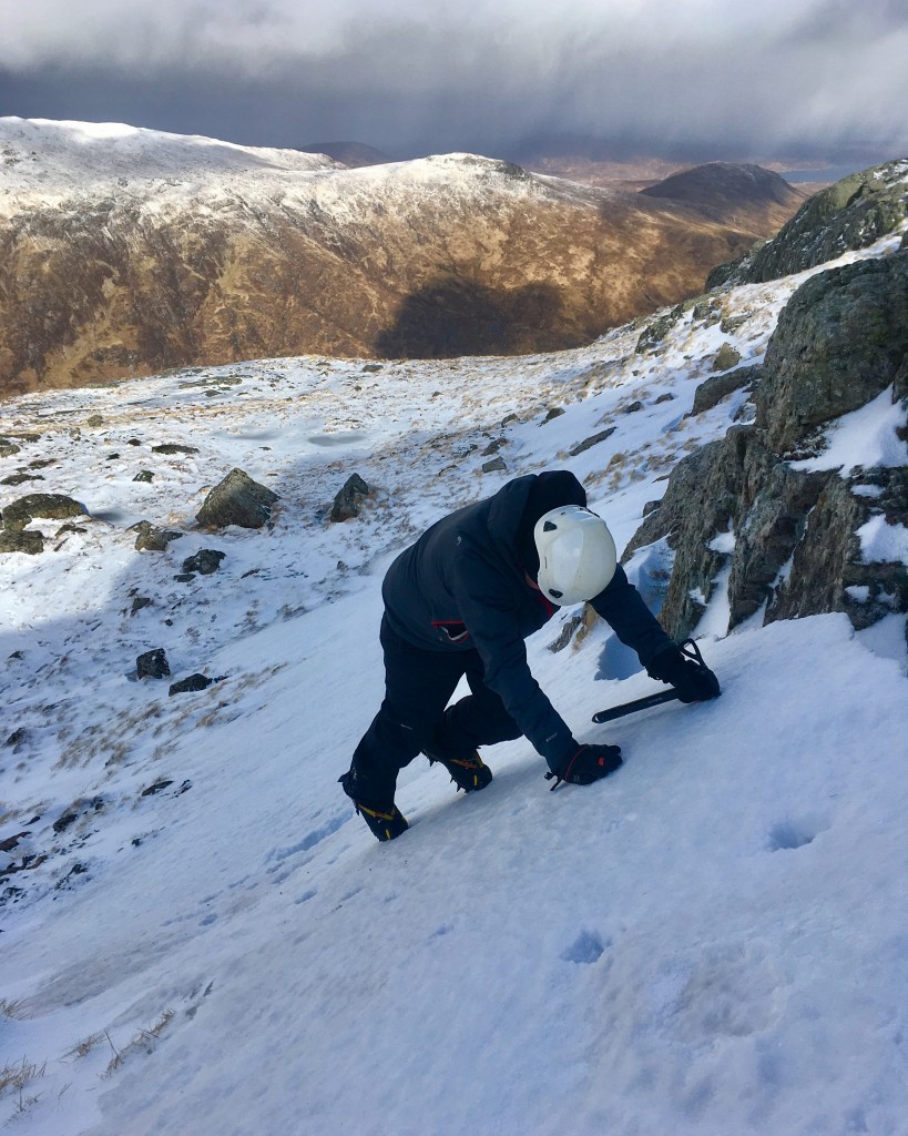 Ian using crampons for the first time on our winter Skills week in Glencoe 