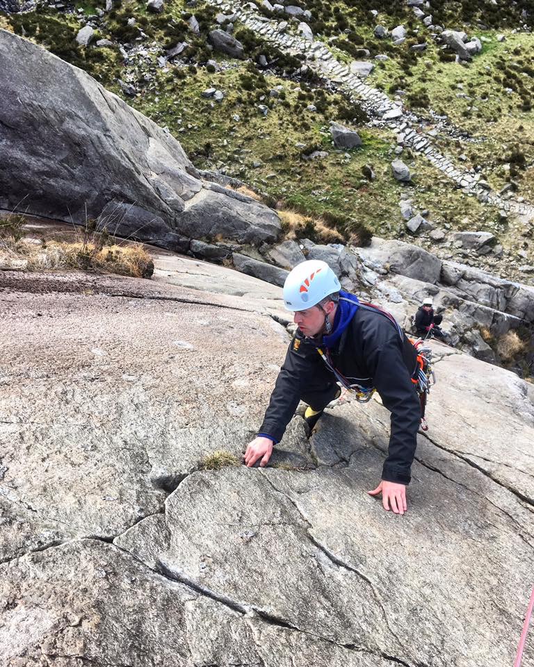 Alastair leading on Idwal Slabs on a trad Climbing coaching weekend in Snowdonia