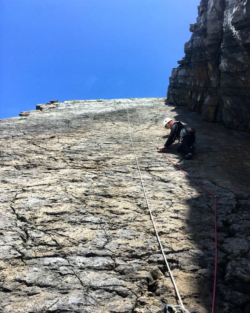 The culmination of her newly gained sea cliff climbing skills, leading me down, then up, Bow Shaped Slab before hoisting me up the final section...