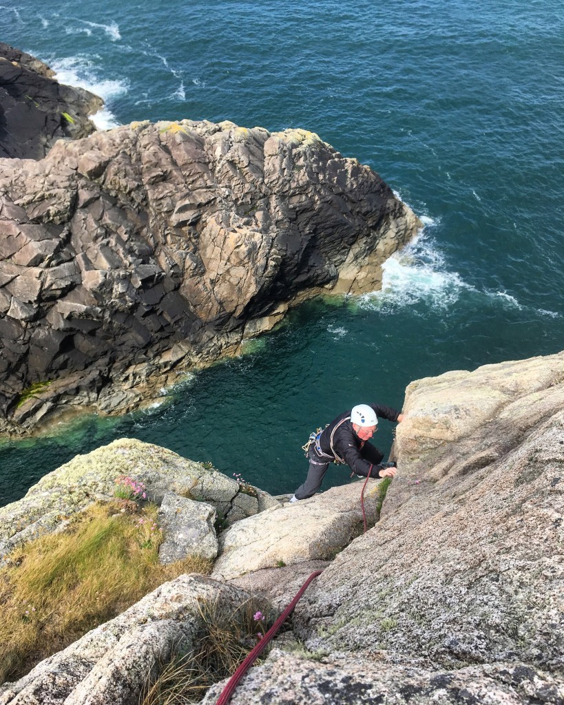Steve enjoying the amazing sea-cliff climbing in Pembrokeshire out at St Davids Head.